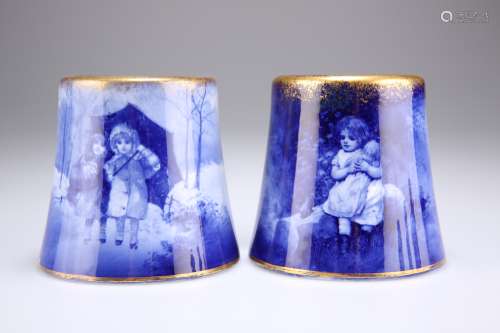 A PAIR OF ROYAL DOULTON BLUE CHILDREN SERIES VASES