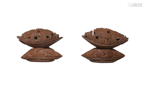 Two CHI. Carved Olive Pit Boats with Stands, 19th