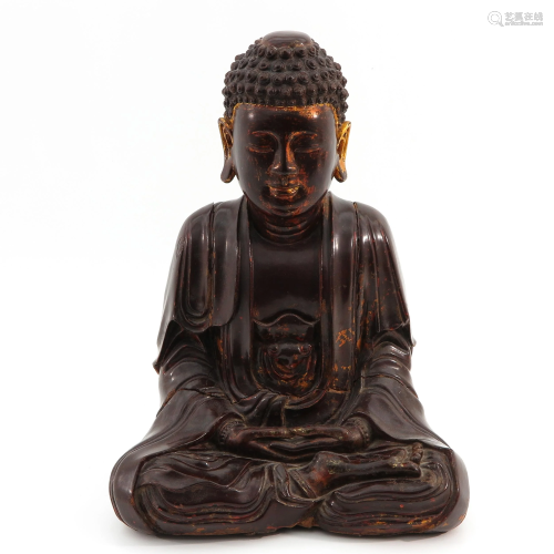 A Carved Wood Meditating Buddha