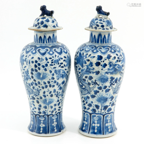 A Pair of Garniture Vases