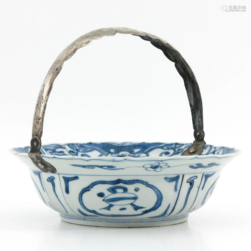 A Blue and White Bowl with Silver Handle