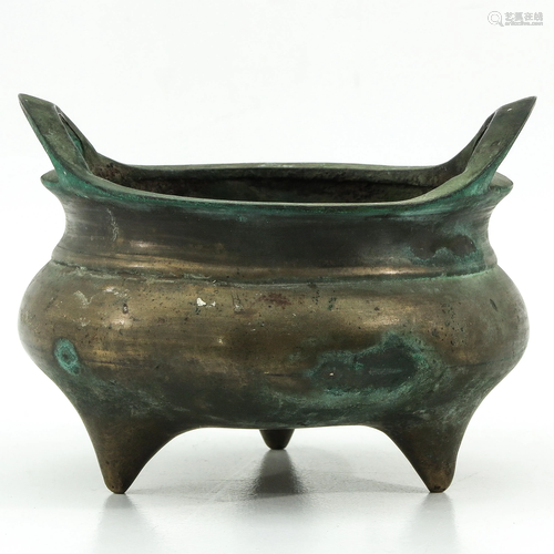 A Bronze Tripod Censer