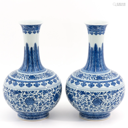 A Pair of Blue and White Bottle Vases