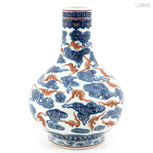 An Iron Red and Blue Bottle Vase