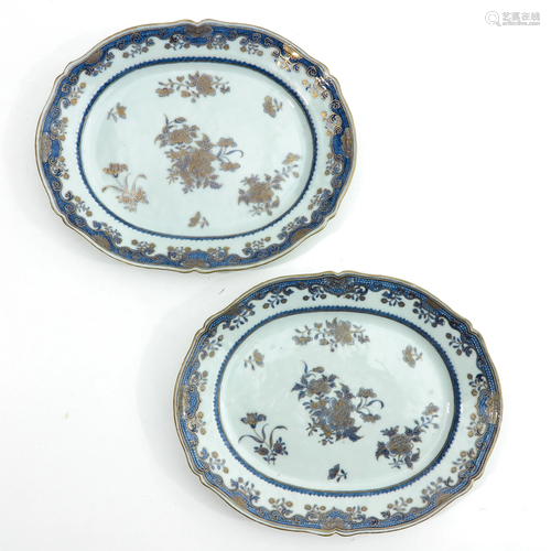 A Pair of Blue and Gilt Serving Trays