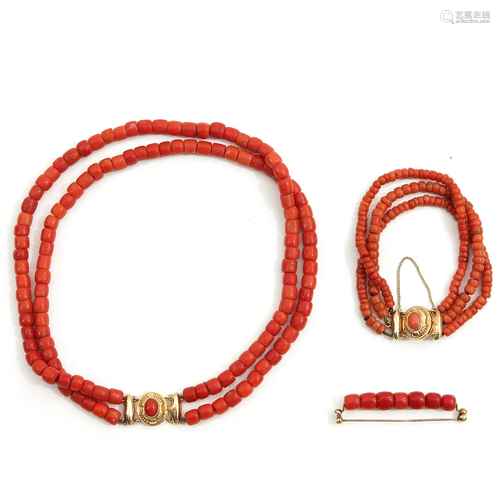 A Collection of Red Coral Jewelry