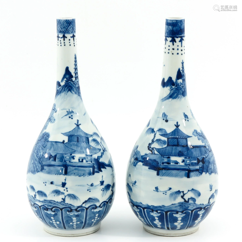 A Pair of Blue and White Bottle Vases