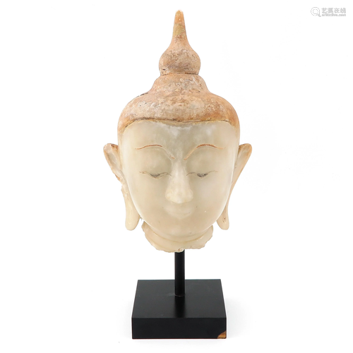 A Carved Alabaster Buddha Sculpture