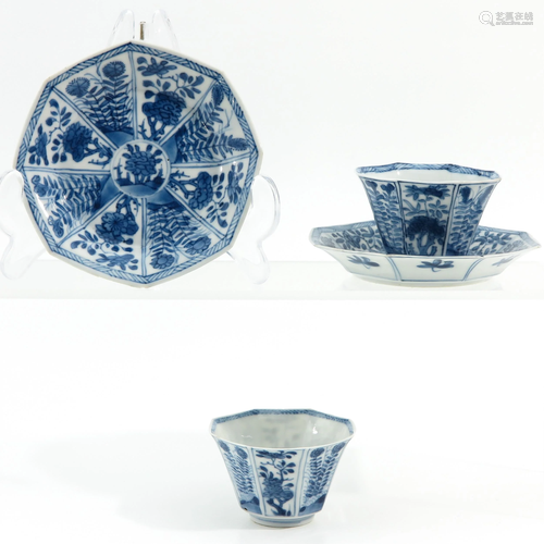 A Pair of Blue and White Cups and Saucers