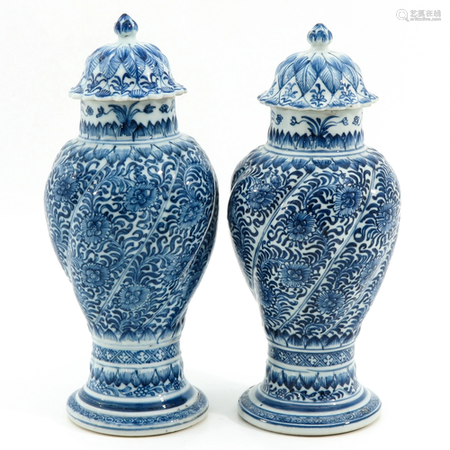 A Pair of Vases with Covers