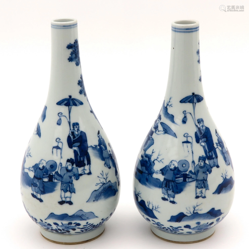 A Pair of Blue and White Bottle Vases