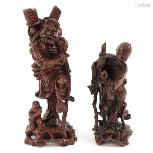 Two Carved Wood Sculptures