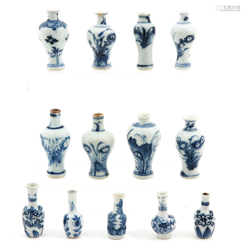 A Collection of 13 Miniature Vases