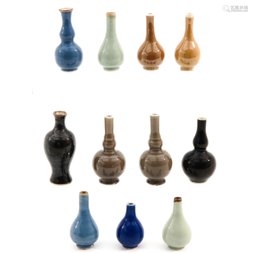 A Collectin of 11 Miniature Vases