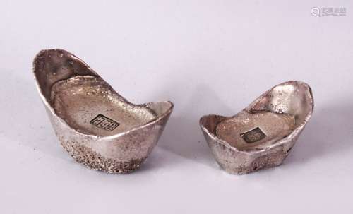 TWO PIECES OF CHINESE WHITE METAL POSSIBLY SILVER SHOE CURRENCY, 7cm and 6.5cm.