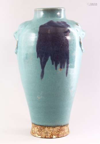 A CHINESE PURPLE SPLASH POTTERY VASE, with moulded lion mask handles, 35cm high.