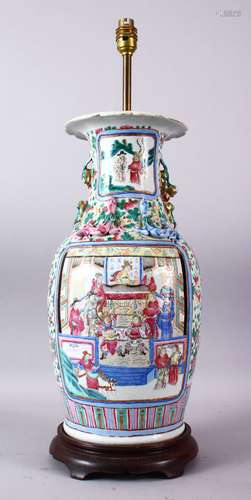 A 19TH CENTURY CHINESE CANTON FAMILLE ROSE PORCELAIN VASE, decorated with two main panels of