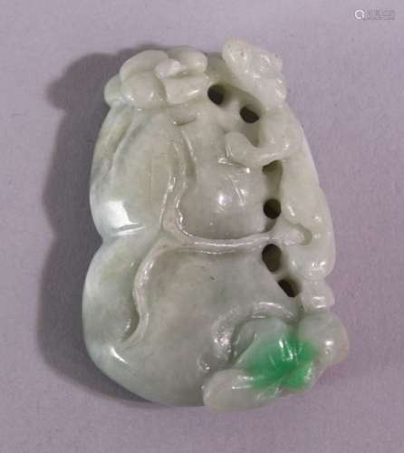 A CHINESE CARVED AND PIERCED JADE / JADITE AMULET, in the form of a guord and animal, 5cm x 3.5cm.