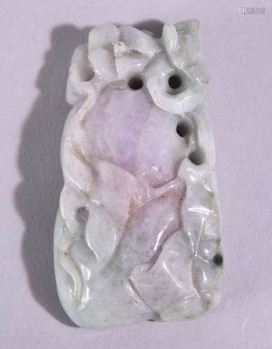 A CHINESE CARVED AND PIERCED JADITE / HARDSTONE AMULET, in the form of a guord and animal, 6cm x