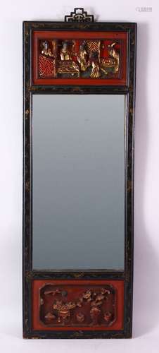 A CHINESE RECTANGULAR MIRROR, with carved gilded and lacquer frame, 86cm x 31cm.