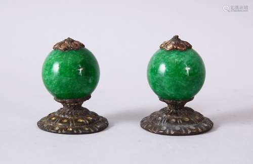 A PAIR OF CHINESE CARVED HARDSTONE & METAL FINIAL / TOPS, the finial each with a nice green carved