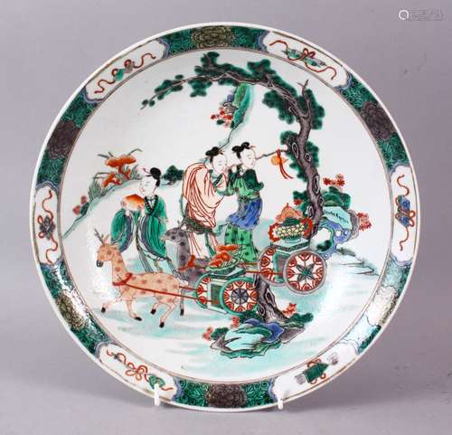 A DECORATIVE 20TH CENTURY FAMILLE VERTE PORCELAIN DISH IN KANGXI STYLE, painted with females in a