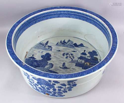 A LARGE 18TH CENTURY CHINESE QIANLONG BLUE & WHITE PORCELAIN BASIN, decorated with views of