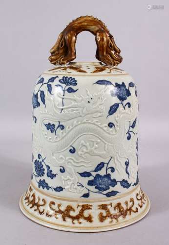 A CHINESE BLUE, WHITE & BISCUIT MING STYLE DRAGON PORCELAIN TEMPLE BELL, the body with moulded