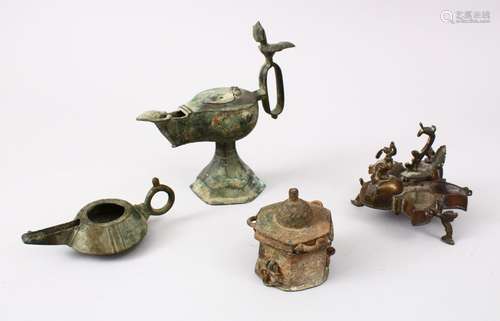 A COLLECTION OF FOUR INDIAN & PERSIAN OIL LAMPS AND A 12TH CENTURY INKWELL (4)