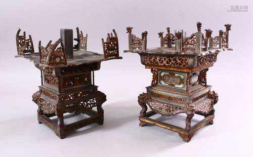 A MATCHED PAIR OF 19TH CENTURY CHINESE SPELTER PAGODA FORM CANDLE STANDS, with cast and pierced