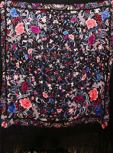 A 20TH CENTURY CHINESE EMBROIDERED BLACK SILK PIANO SHAWL / TEXTILE, with floral embroidery and