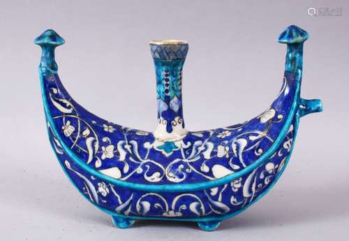 A 19TH / 20TH CENTURY IZNIK POTTERY UNUSUAL HOLY WATER FLASK, with a blue ground and white motif