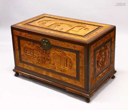 A GOOD 20TH CENTURY CHINESE CARVED CAMPHORWOOD CHEST, the top and sides well carved with figures