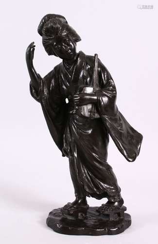 A JAPANESE MEIJI PERIOD BRONZE OKIMONO OF A GEISHA GIRL, stood holding her musical instrument,