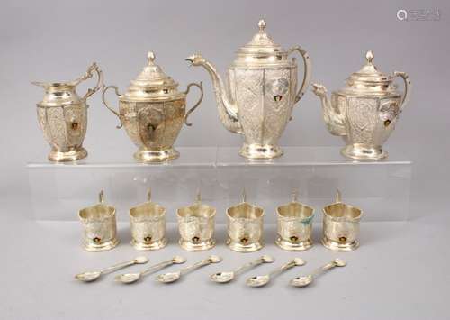 A LARGE SILVER PERSIAN TEA SET WITH KUWAITI EMBLEM, comprising six small cups, 6.5cm, tea pot, 22cm,