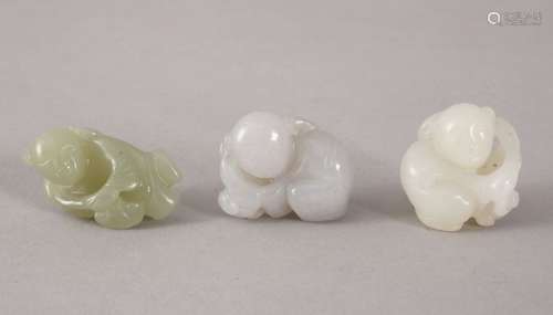 THREE 19TH / 20TH CENTURY CHINESE CARVED WHITE / CELADON JADE FIGURES - BOYS, the carving