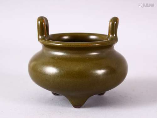 A CHINESE SMALL TEA GLAZE TWIN HANDLED CENSER, impressed mark to base, 8.5cm diameter.