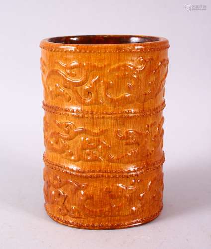 A SMALL UNUSUAL CHINESE SIMULATED BAMBOO MOULDED POTTERY BRUSH POT, decorated with three bands of