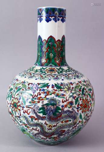 A CHINESE DOUCAI DECORATED PORCELAIN DRAGON BOTTLE VASE, decorated with scenes of dragons amongst