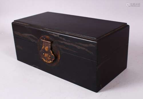 A CHINESE HARDWOOD RECTANGULAR HINGED BOX, 26cm long.