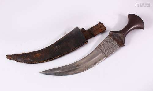 AN 18TH/19TH CENTURY INDIAN JAMBYIA, with steel hilt, the curving blade decorated with hunting