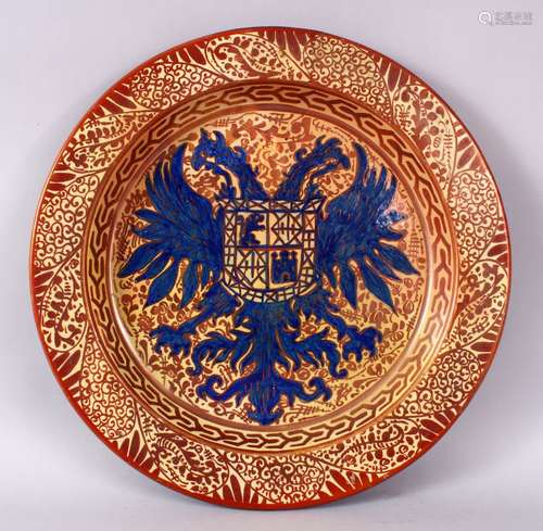 A ISLAMIC HISPANO MORESQUE LUSTRE CIRCULAR DISH, the centre unusually painted with an armorial crest