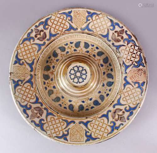 A GOOD LARGE EARLY ISLAMIC HISPANO MORESQUE LUSTRE DECORATED WATER BASIN, with a central stepped,