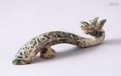 A CHINESE CARVED JADE ARCHAIC STYLE CHILONG BELT BUCKLE, 10cm long.