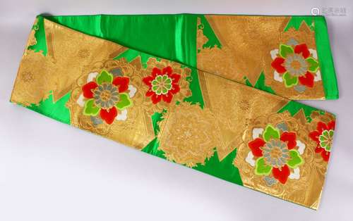 A FINE JAPANESE SILK EMBROIDERED FUKURO OBI TIE - upon a green ground with gold, green, white &