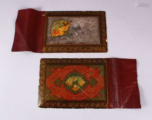 A KHATIMI LACQUER BOOK COVER in two parts, the upper part with engraved silver panel, 25cm x 17cm.