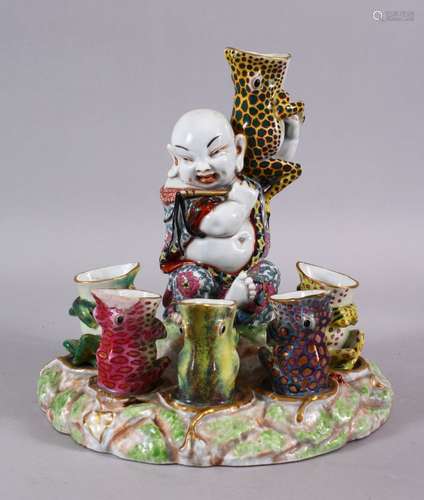 A CHINESE REPUBLIC STYLE PORCELAIN FLOWER / EGG HOLDER OF BUDDHA AND FROGS, the frogs seated with