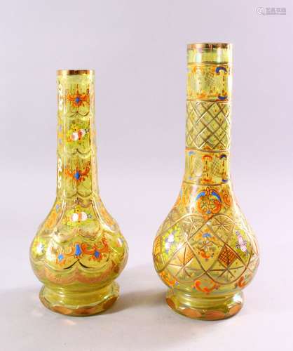 TWO 20TH CENTURY ISLAMIC GREEN GLASS HUQQA BASES / VASES, both with floral and scrollwork