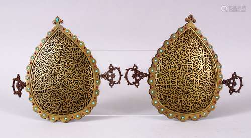 A PAIR OF 19TH CENTURY ISLAMIC GILT METAL OPENWORK CALLIGRAPHIC PANELS, inlaid with turquoise and