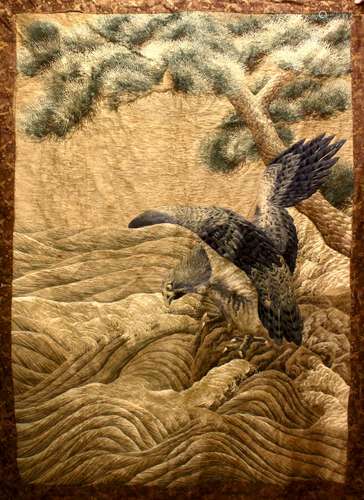 A LARGE JAPANESE MEIJI PERIOD EMBROIDERED SILK TEXTILE OF A SEA EAGLE, the finely embroidered